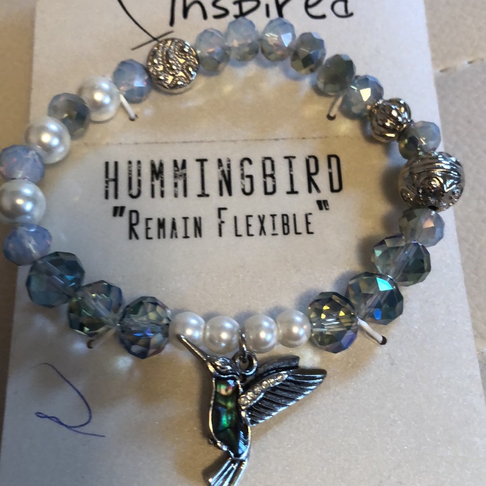 NWT stretch bracelet with lite blue and faux pearl beads hummingbird charm